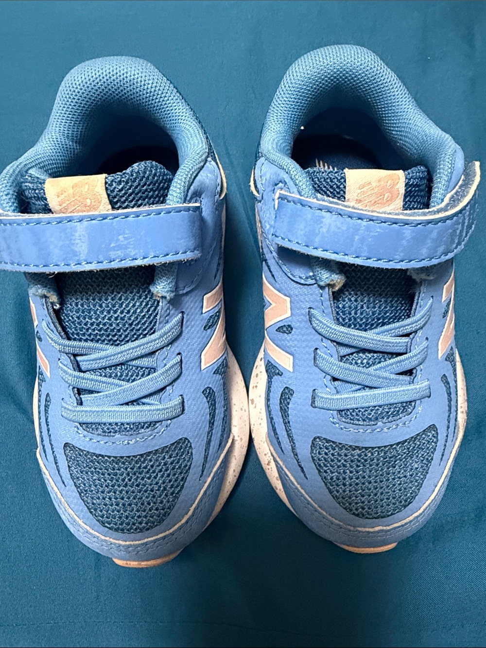 New Balance Kids Light Blue Sneakers with Pale Pink Accents